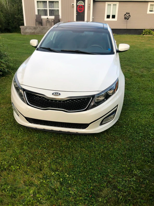 2015 Kia Optima, 121.617 km, Import Kanada — Foto 1