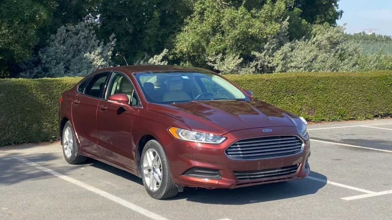2016 Ford Fusion SE, rot, 151.000 km, Import VAE — Foto 1
