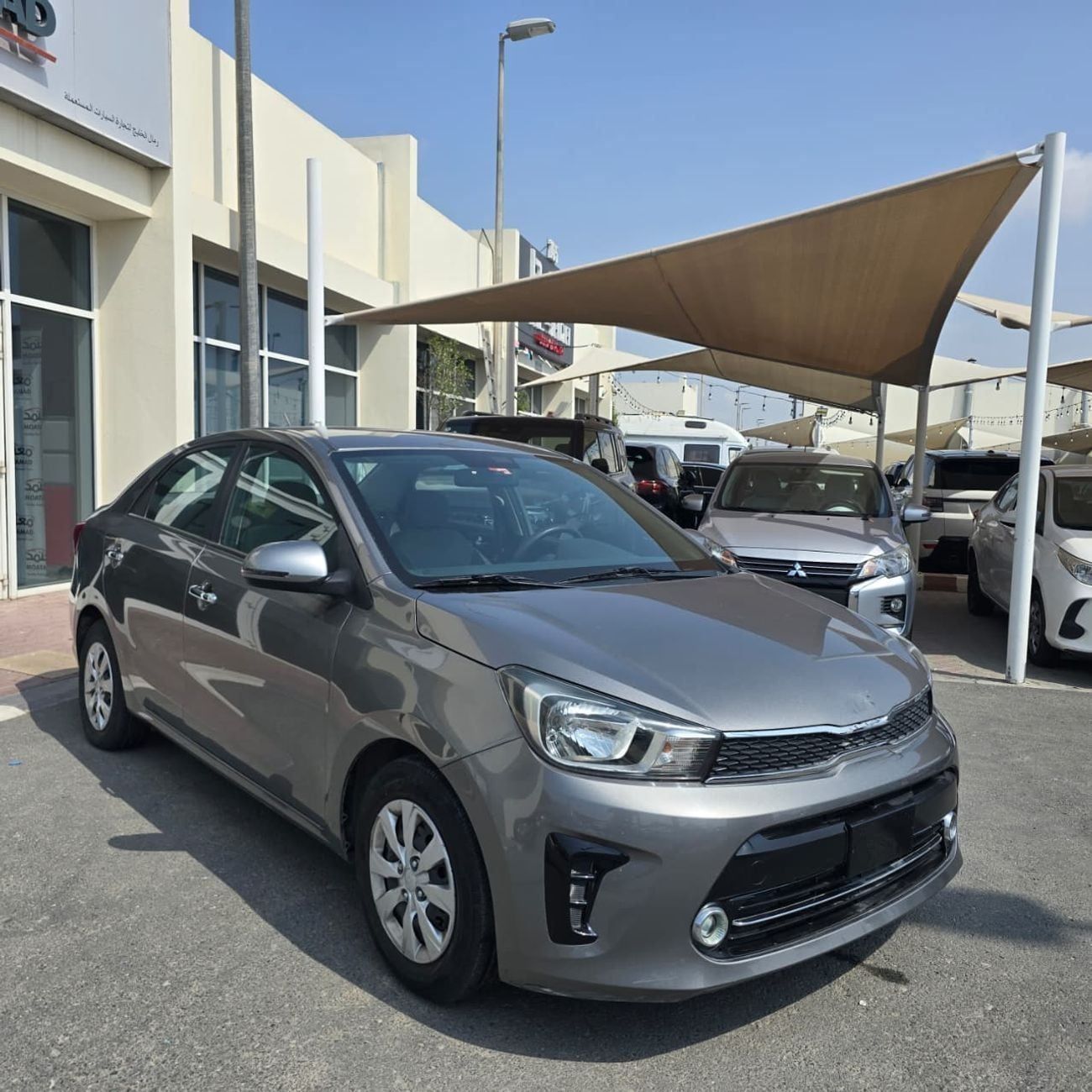 2023 Kia Pegas LX, grau, 85.483 km, Import VAE — Foto 1