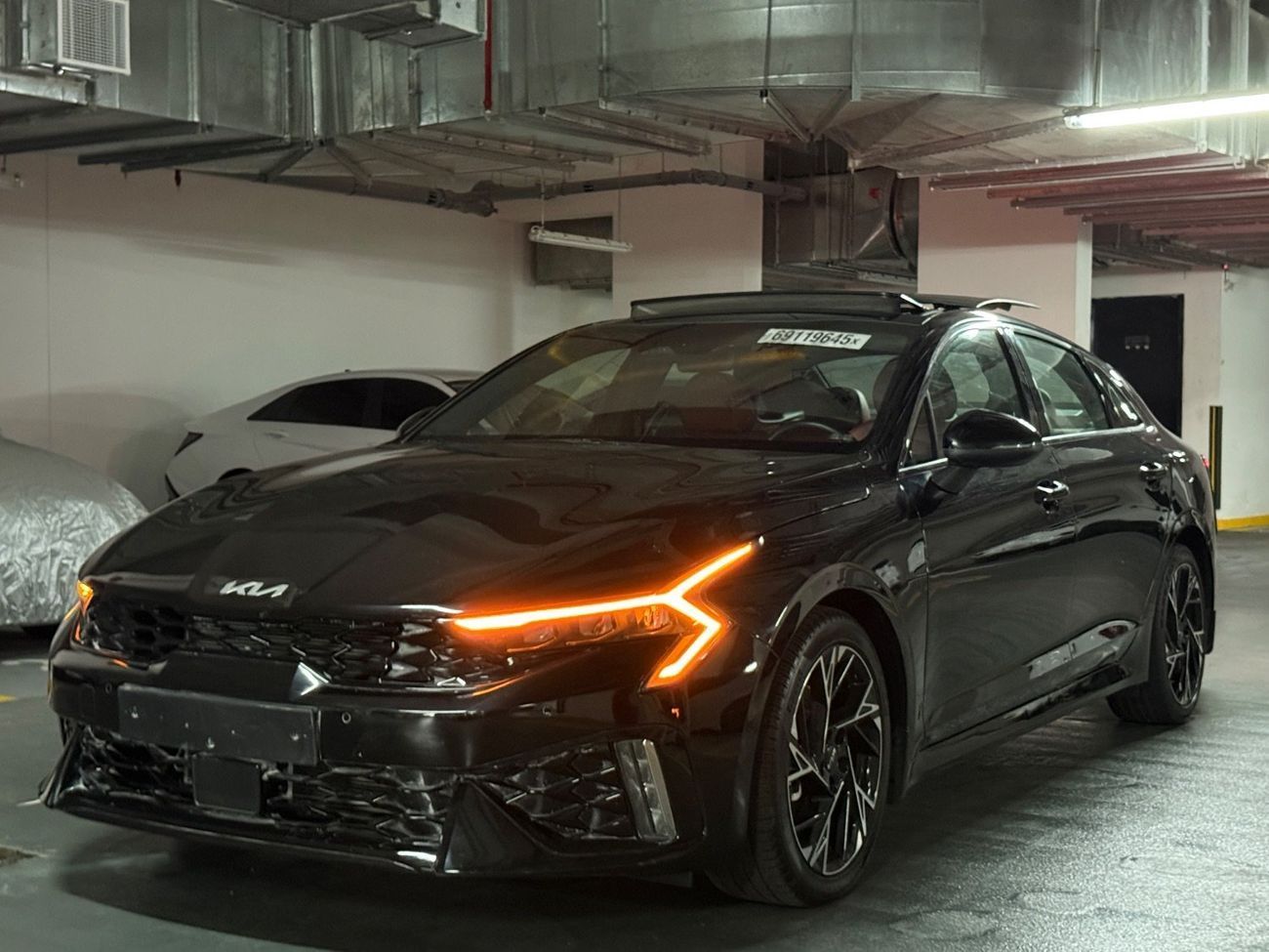 2025 Kia K5 EX, schwarz, 15.000 km, Import VAE — Foto 1