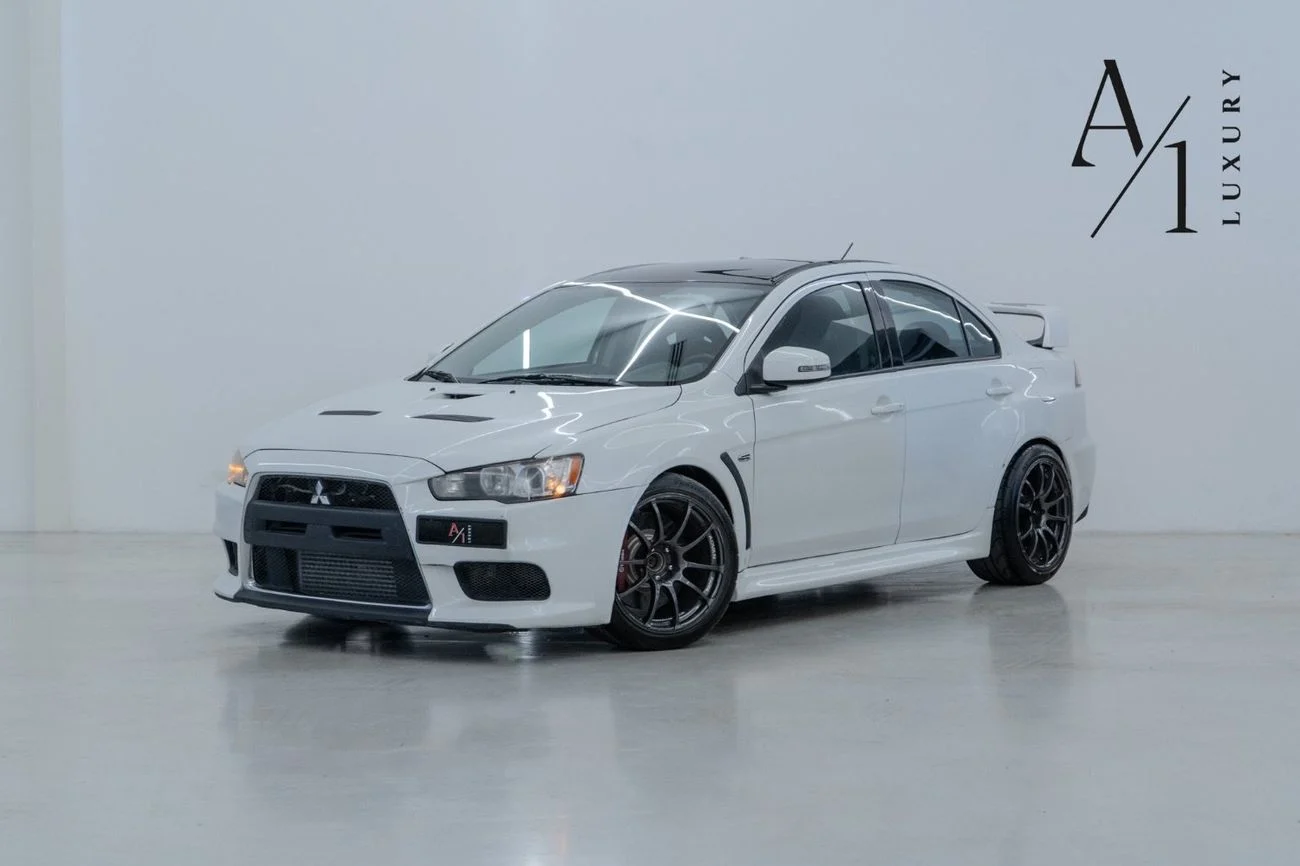 2015 Mitsubishi Lancer Evolution, weiß, 107.750 km, Import VAE — Foto 1