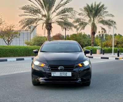 2024 Nissan Versa STANDARD, schwarz, 40.000 km, Import VAE — Foto 2 z 16