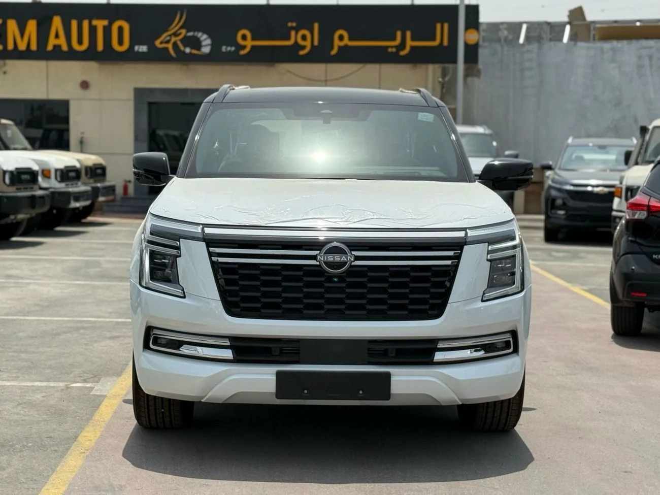2026 Nissan Patrol LE PLATINUM CITY, weiß, 0 km, Import VAE — Foto 1