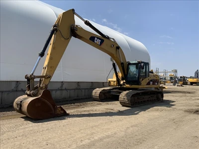 2010 Caterpillar 329D, 1 mth, Import Kanada — Foto 1