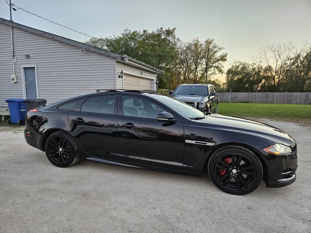 2015 Jaguar Xj, schwarz, 123.500 km, Import Kanada — Foto 1