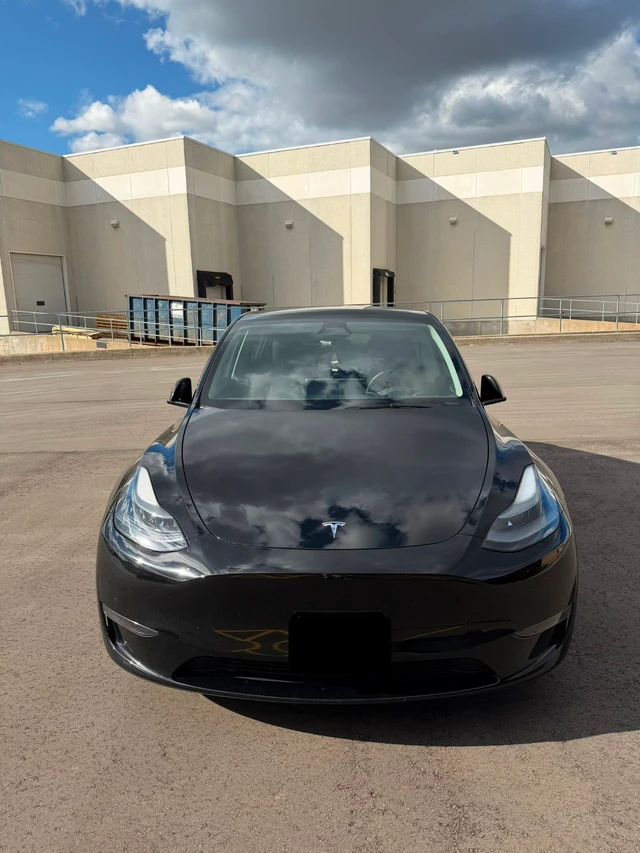 2024 Tesla Model Y Performance, schwarz, 27.383 km, Import Kanada — Foto 1