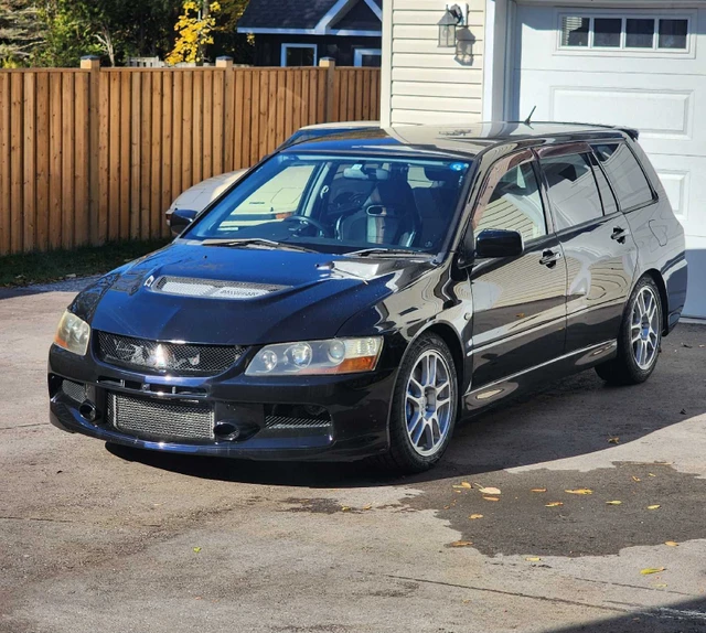 2005 Mitsubishi Evolution, schwarz, 92.000 km, Import Kanada — Foto 1