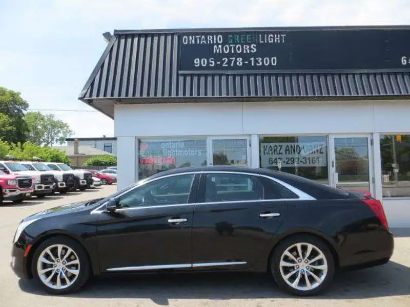 2015 Cadillac XTS CERTIFIED, 1 OWNER, ALL WHEEL DRIVE, PREMIUM, schwarz, 169.000 km, Import Kanada — Foto 1