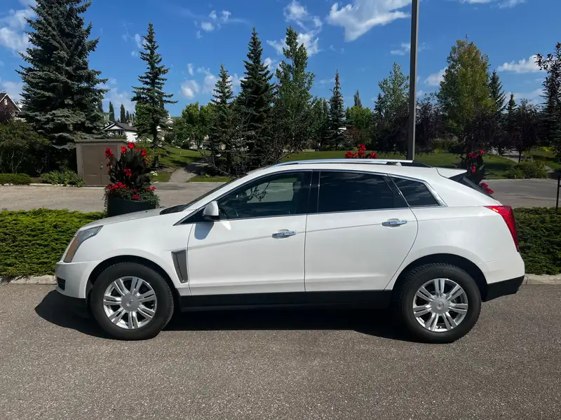 2015 Cadillac SRX Luxury, weiß, 145.000 km, Import Kanada — Foto 1