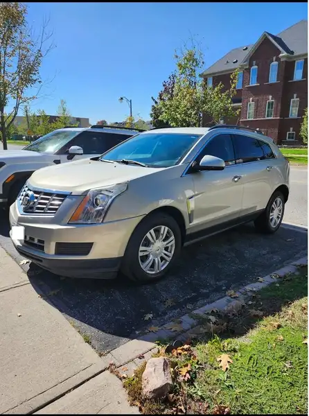 2015 Cadillac SRX, gold, 175.000 km, Import Kanada — Foto 1