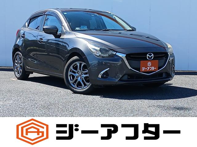 Mazda Demio, braun, Import Japan — Foto 1