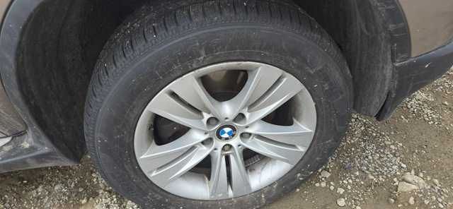 255/5518 Pirelli Scorpion All Season Wheel + Tires - 2007 BMW X5, Import Kanada — Foto 1