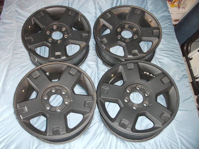 Ford F150, OE 18” Alloy Rims, Black, použitý, sada 4 w/ Hubcaps, schwarz, Import Kanada — Foto 1