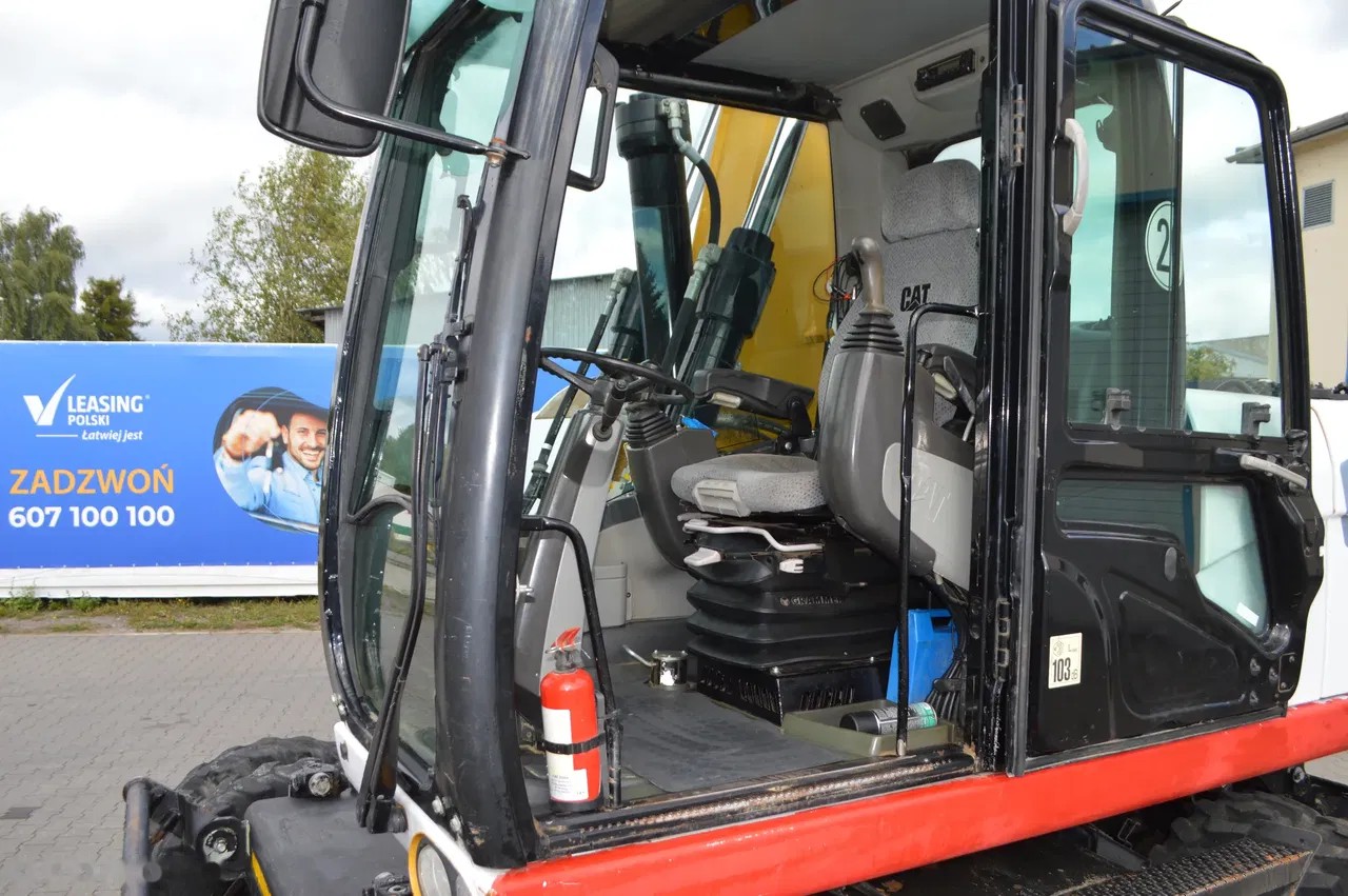 2011 Caterpillar M316 D, 13.838 mth, Import Auf Lager in der EU — Foto 9 z 22