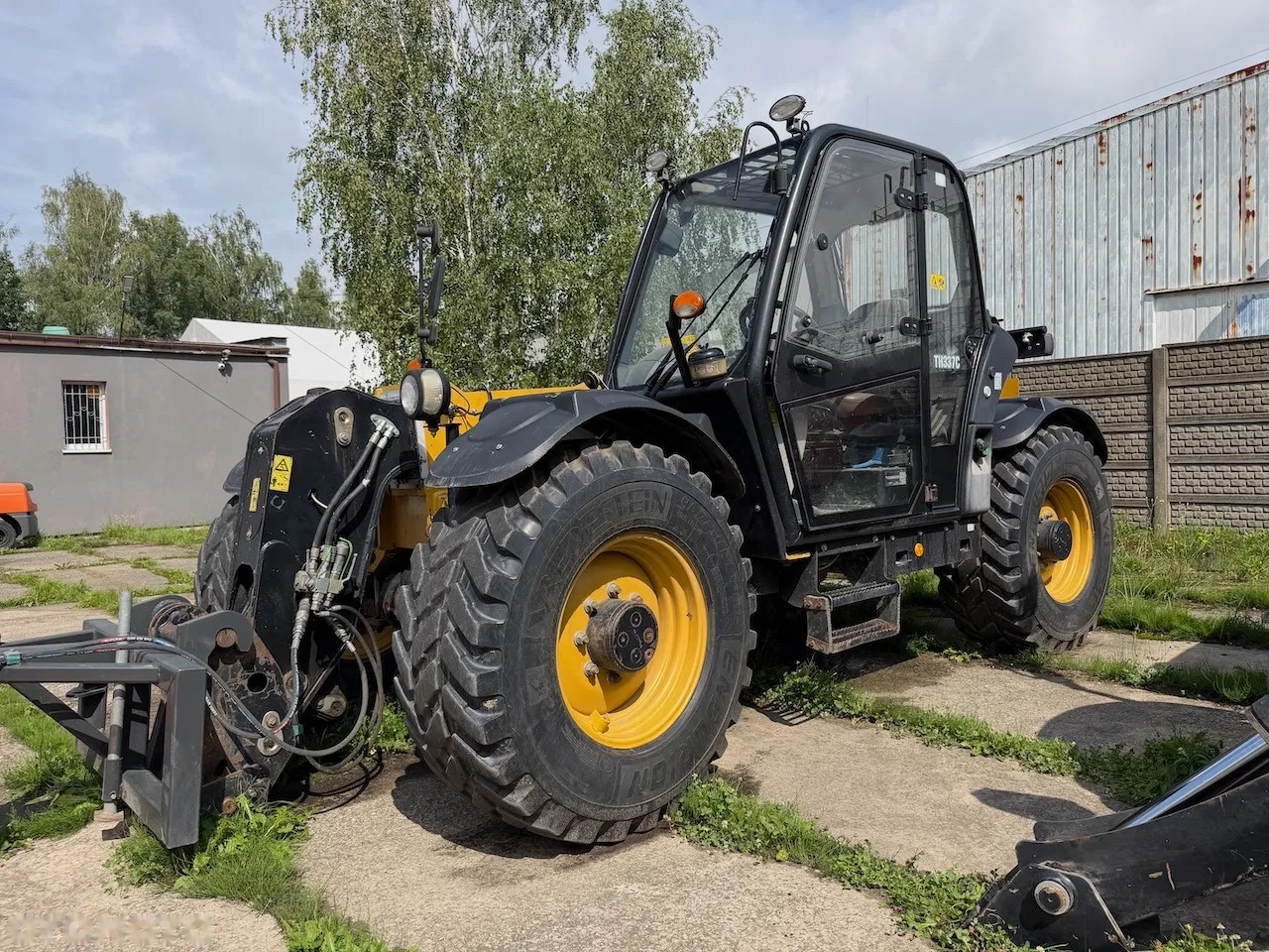 2016 Caterpillar TH337C, 7.400 mth, Import Auf Lager in der EU — Foto 7 z 12