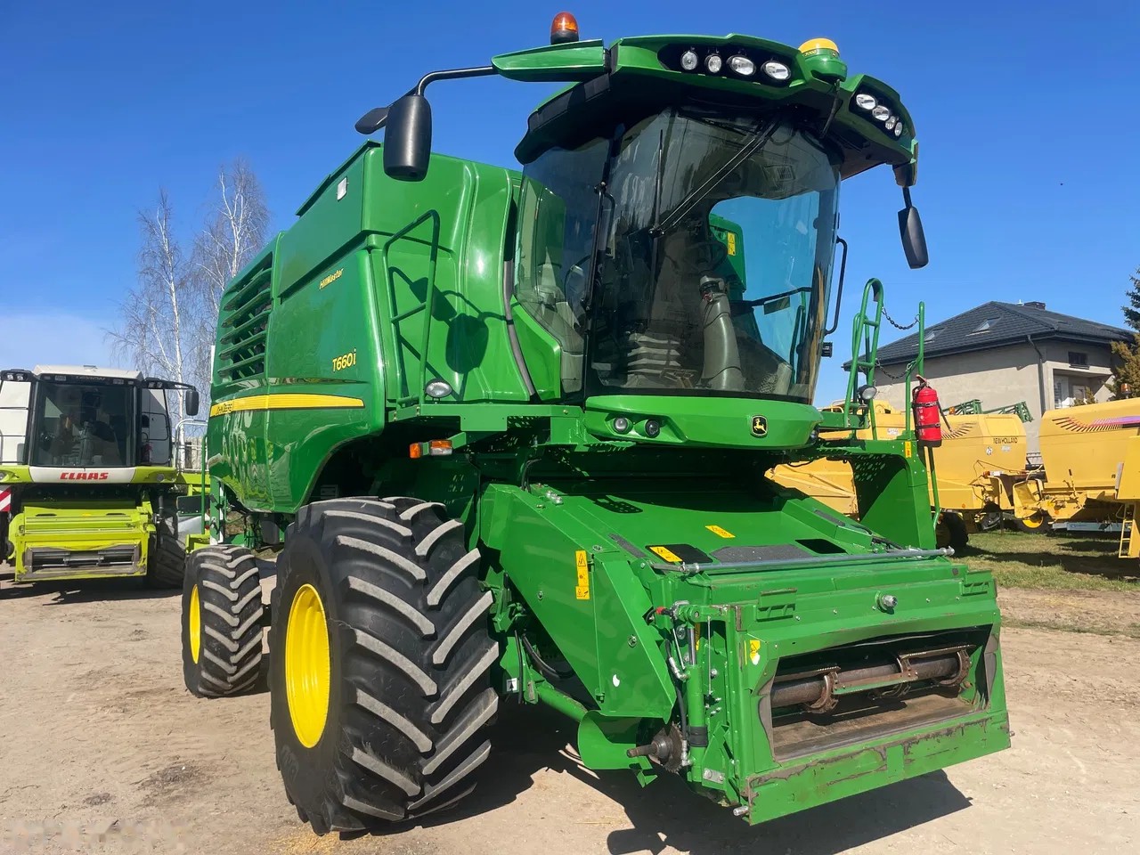 2016 John Deere T660i HM, Import Auf Lager in der EU — Foto 3 z 24