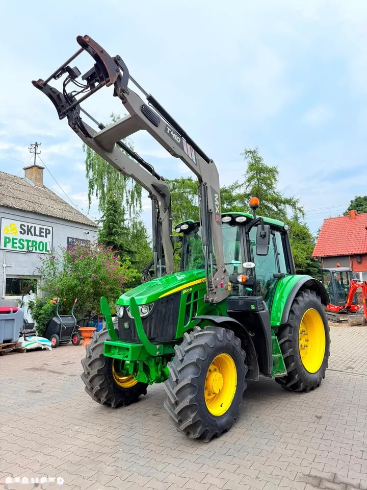 2020 John Deere 6100M, 5.500 mth, Import Auf Lager in der EU — Foto 1