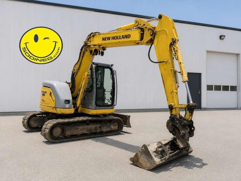 2007 New Holland KOBELCO E70SR-1ES, 10.000 mth, Import Auf Lager in der EU — Foto 1 | AMECAR 2007 New Holland KOBELCO E70SR-1ES, 10.000 mth, Import Auf Lager in der EU — Foto 1