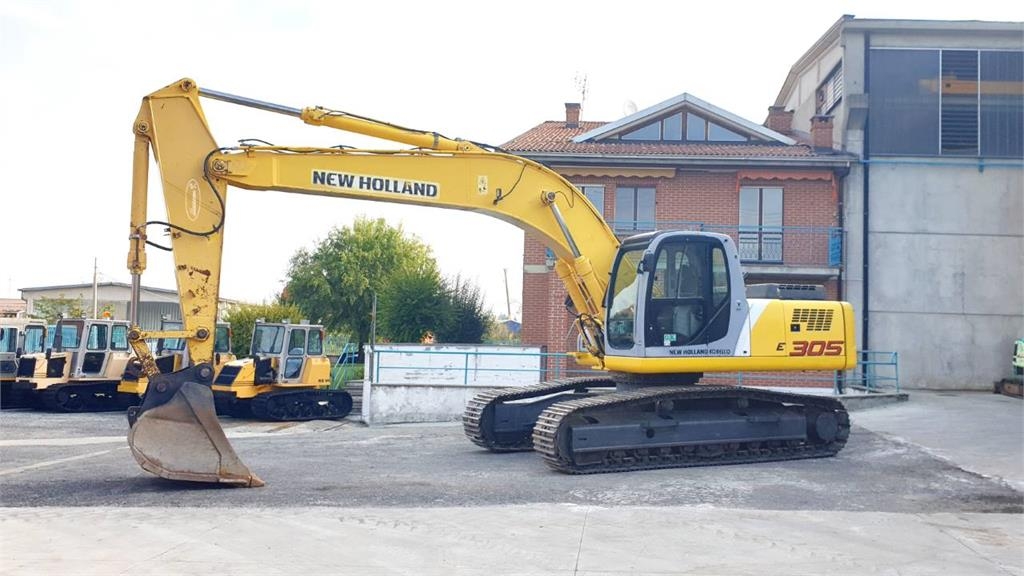 2006 New Holland E305, 8.541 mth, Import Auf Lager in der EU — Foto 1 | AMECAR 2006 New Holland E305, 8.541 mth, Import Auf Lager in der EU — Foto 1
