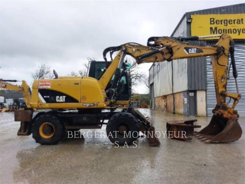2012 Cat M313D, 7.326 mth, Import Auf Lager in der EU — Foto 1