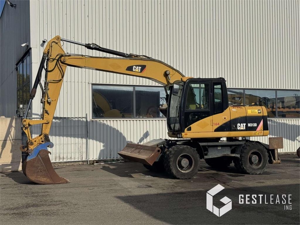 2008 Cat M313D, 3.317 mth, Import Auf Lager in der EU — Foto 1
