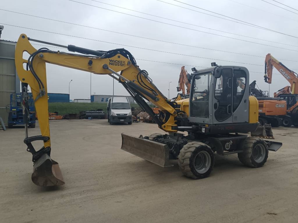 2015 Wacker Neuson EW 100, 7.028 mth, Import Auf Lager in der EU — Foto 1 | AMECAR 2015 Wacker Neuson EW 100, 7.028 mth, Import Auf Lager in der EU — Foto 1