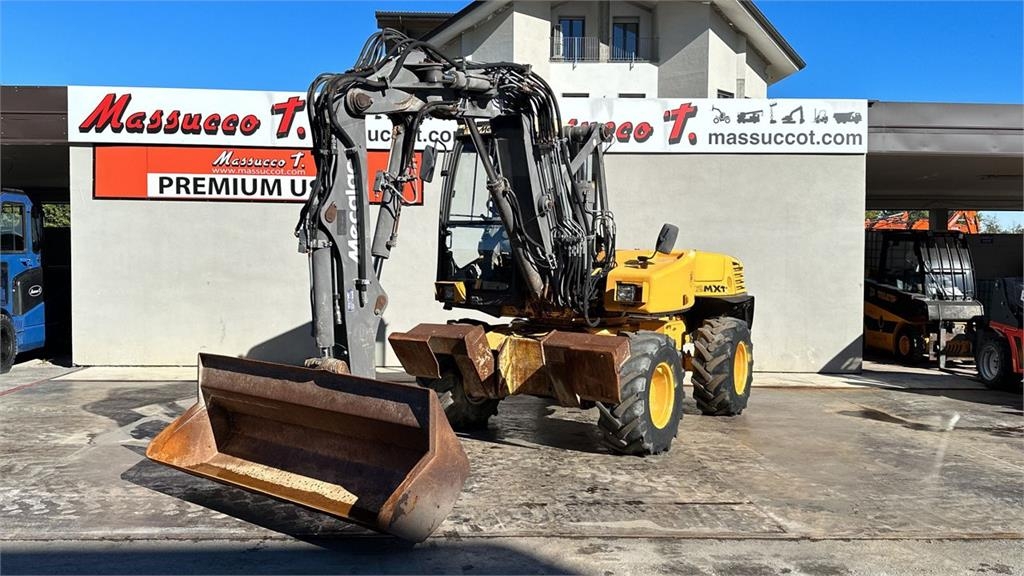 2000 Mecalac 12MXT - E, 5.500 mth, Import Auf Lager in der EU — Foto 1 | AMECAR 2000 Mecalac 12MXT - E, 5.500 mth, Import Auf Lager in der EU — Foto 1