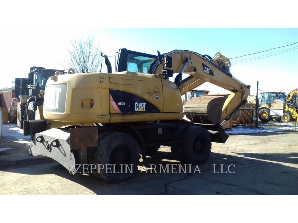 2014 Cat M313D, 4.147 mth, Import Auf Lager in der EU — Foto 1