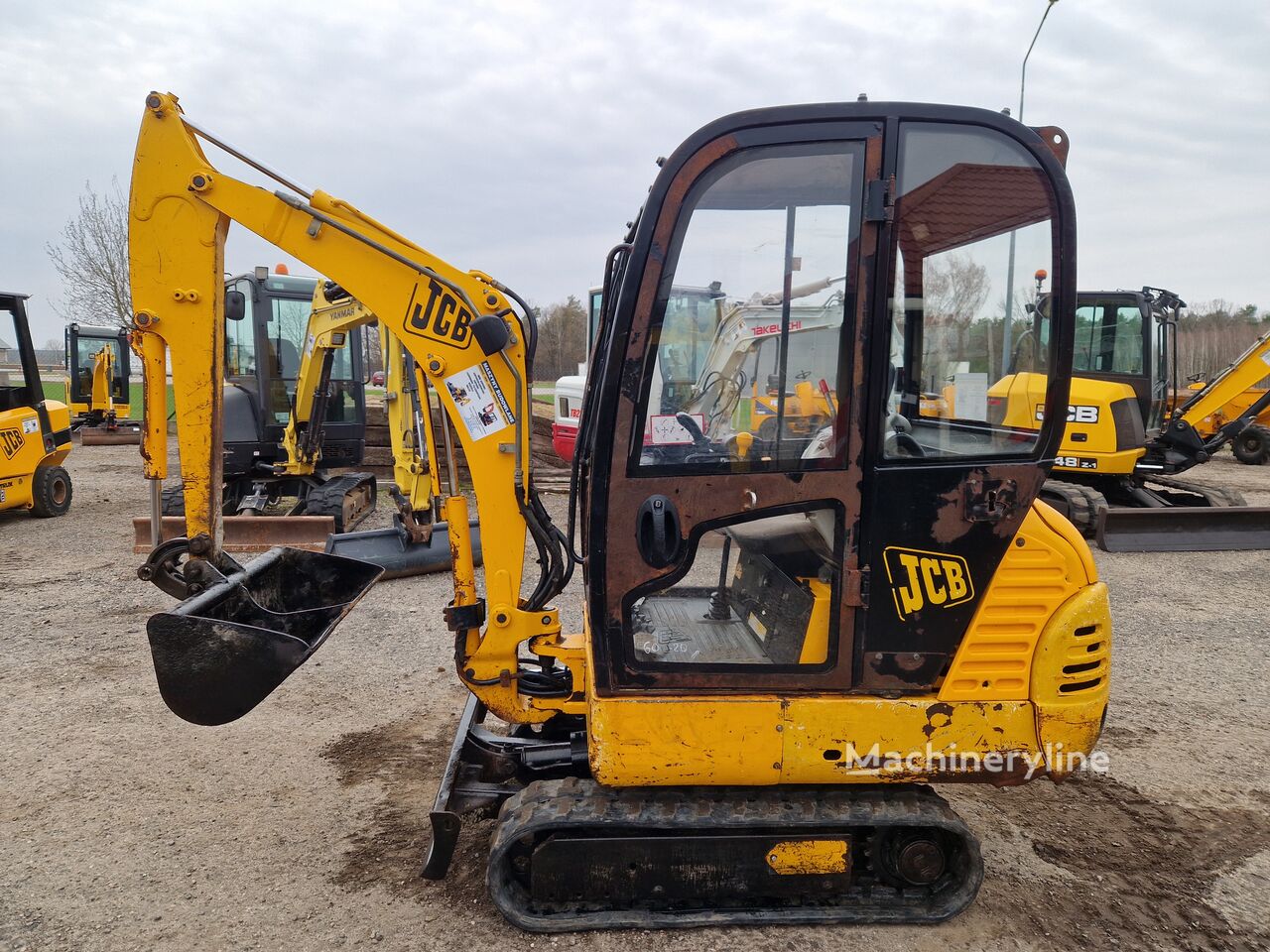 2003 JCB 8015, 3.000 mth, Import Auf Lager in der EU — Foto 1