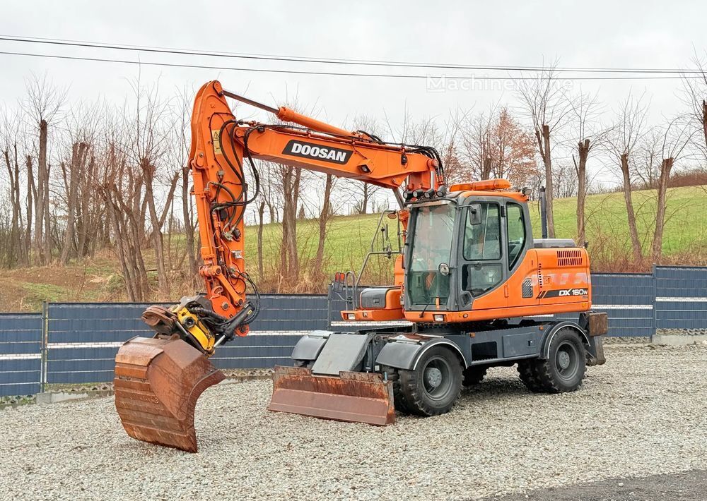 2012 Doosan DX160W, 11.500 mth, Import Auf Lager in der EU — Foto 1 | AMECAR 2012 Doosan DX160W, 11.500 mth, Import Auf Lager in der EU — Foto 1