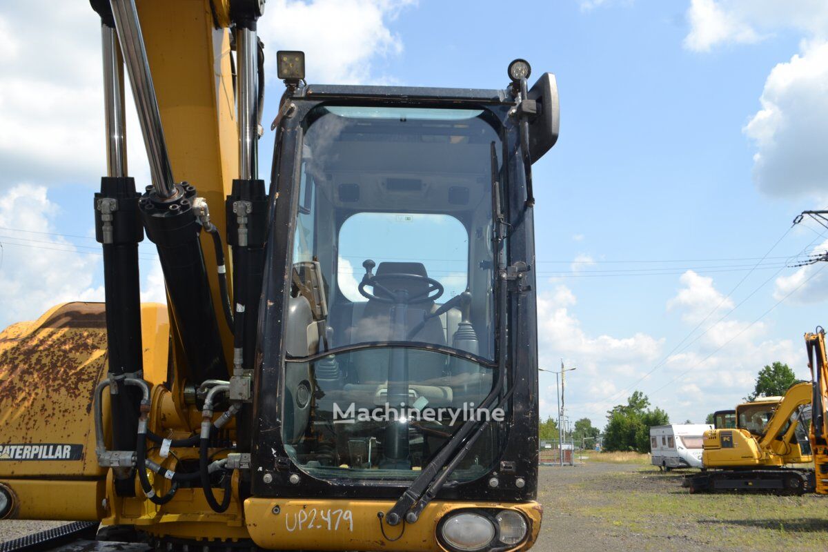 2012 Caterpillar M315D, 14.207 mth, Import Auf Lager in der EU — Foto 11 z 16