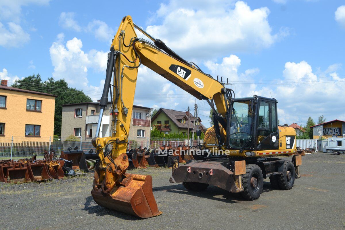 2012 Caterpillar M315D, 14.207 mth, Import Auf Lager in der EU — Foto 3 z 16
