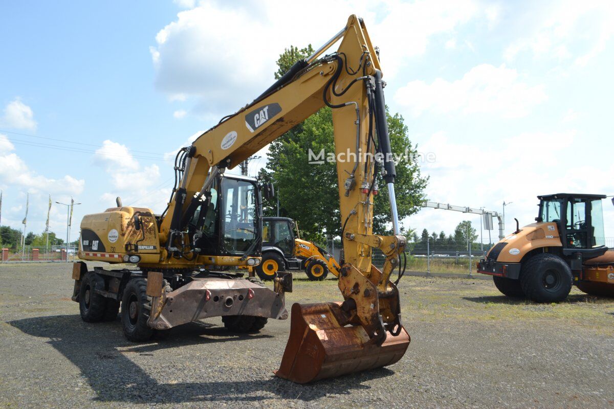 2012 Caterpillar M315D, 14.207 mth, Import Auf Lager in der EU — Foto 4 z 16