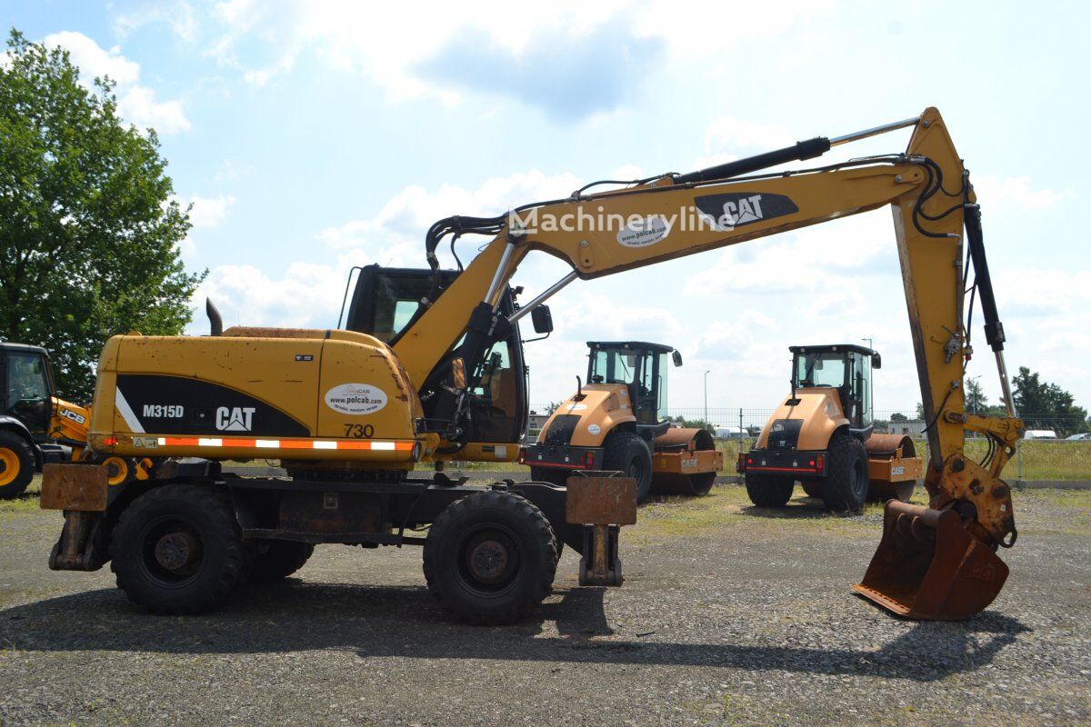 2012 Caterpillar M315D, 14.207 mth, Import Auf Lager in der EU — Foto 5 z 16
