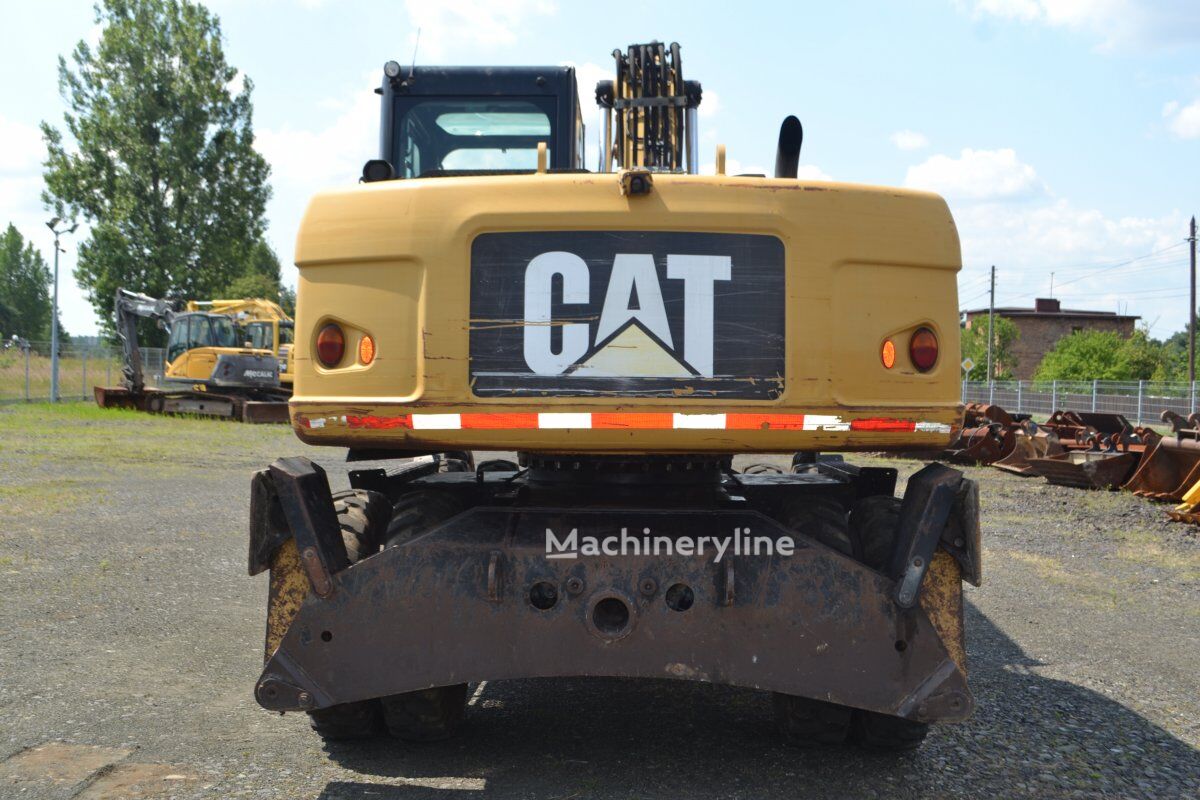 2012 Caterpillar M315D, 14.207 mth, Import Auf Lager in der EU — Foto 7 z 16