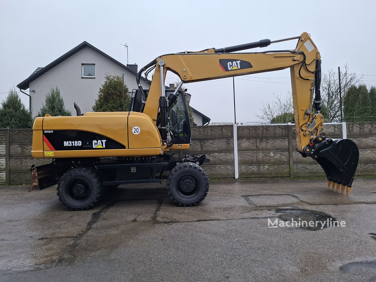 2012 Caterpillar M318, 10.900 mth, Import Auf Lager in der EU — Foto 10 z 16