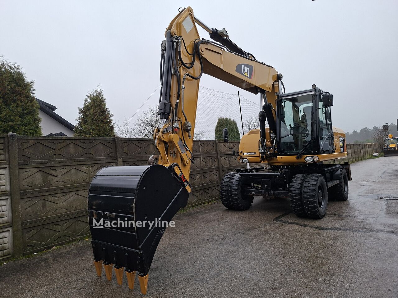 2012 Caterpillar M318, 10.900 mth, Import Auf Lager in der EU — Foto 2 z 16