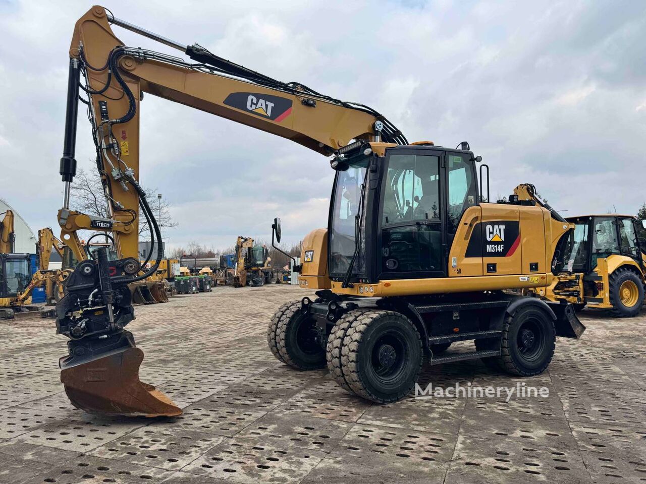 2019 Caterpillar M314F, 5.453 mth, Import Auf Lager in der EU — Foto 1