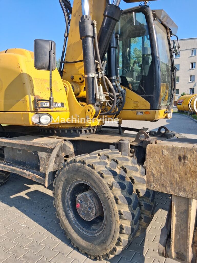 2007 Caterpillar M322, 21.594 mth, Import Auf Lager in der EU — Foto 6 z 16