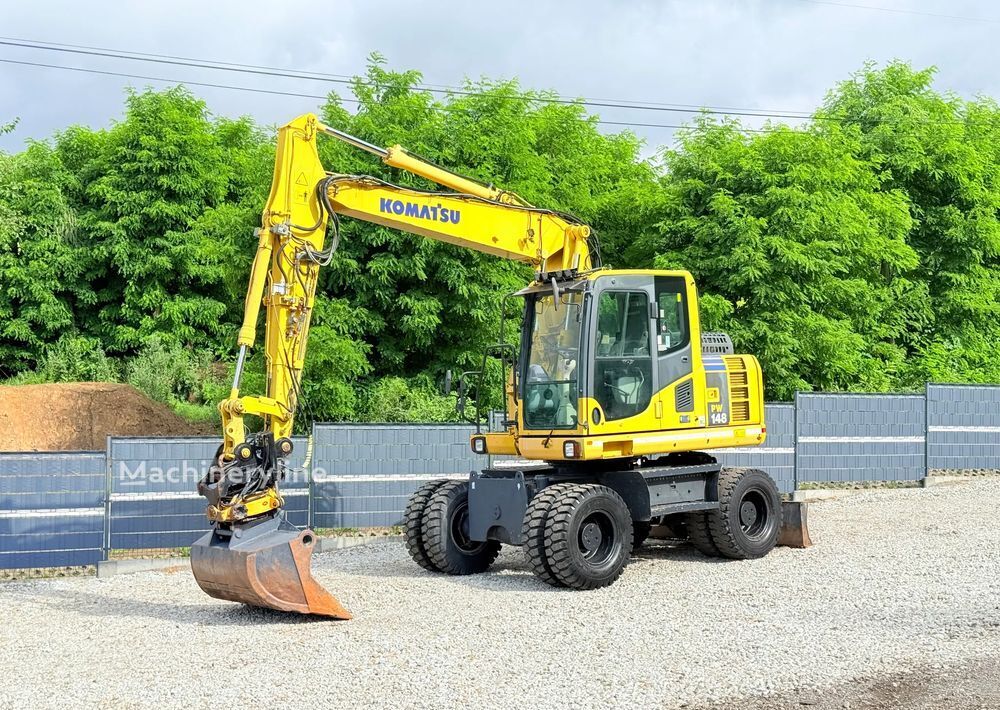 2011 Komatsu PW148, 13.200 mth, Import Auf Lager in der EU — Foto 1 | AMECAR 2011 Komatsu PW148, 13.200 mth, Import Auf Lager in der EU — Foto 1