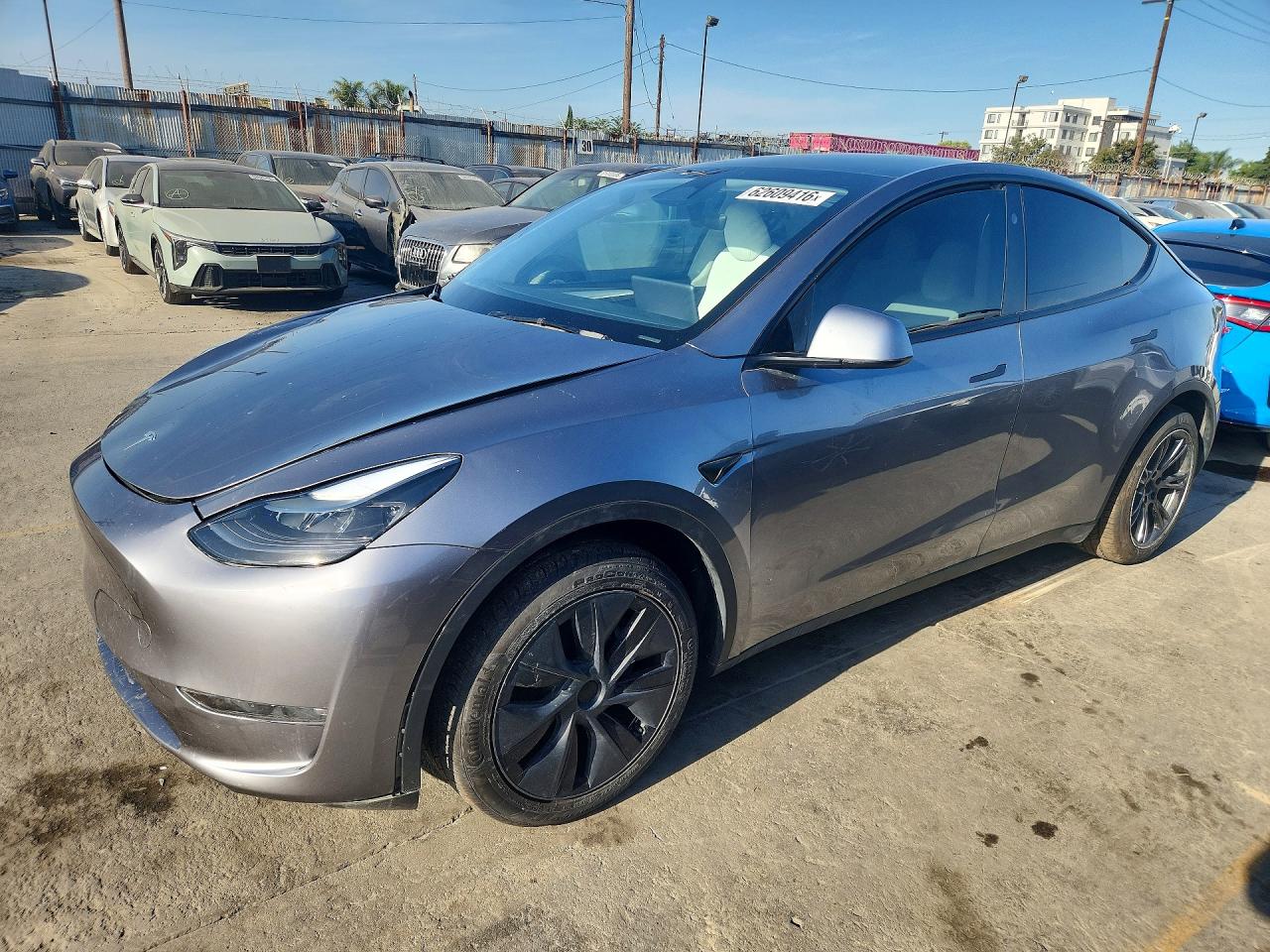 2025 Tesla MODEL Y, silber, 10.070 km, Import USA — Foto 1 2025 Tesla MODEL Y, silber, 10.070 km, Import USA — Foto 1