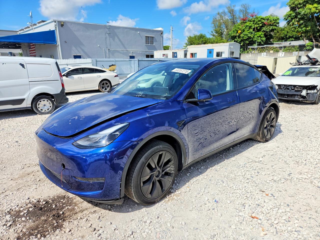 2025 Tesla MODEL Y, blau, 42.161 km, Import USA — Foto 1 2025 Tesla MODEL Y, blau, 42.161 km, Import USA — Foto 1